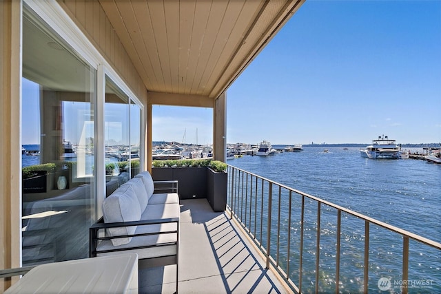 65 Kirkland Ave Unit 108, Kirkland, WA 98033 - balcony featuring a water view and outdoor lounge area