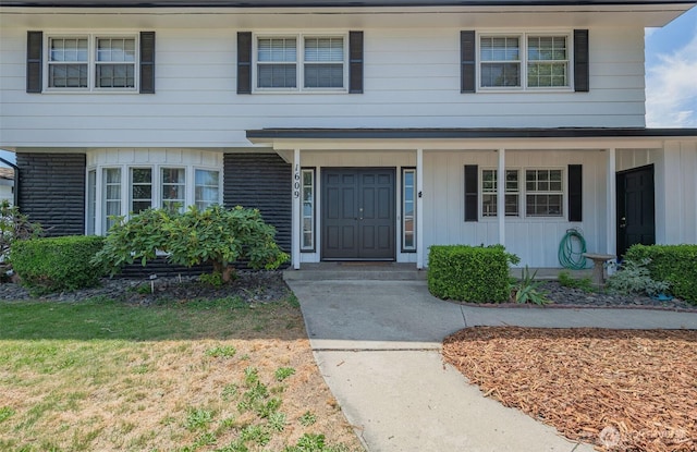 1609 Russell St, Wenatchee, WA 98801 - view of front facade with brick siding and a porch