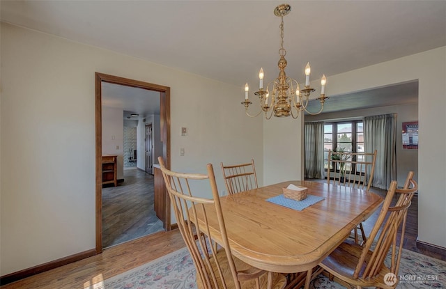 1609 Russell St, Wenatchee, WA 98801 - dining room featuring a chandelier and wood finished floors