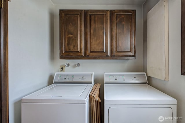 1609 Russell St, Wenatchee, WA 98801 - laundry room featuring separate washer and dryer and cabinet space