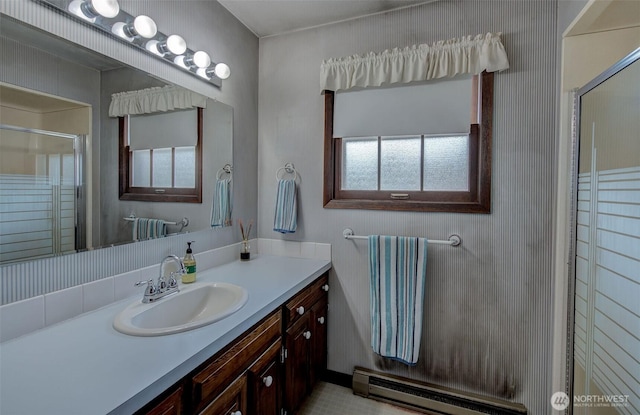1609 Russell St, Wenatchee, WA 98801 - full bathroom featuring a stall shower, a baseboard radiator, and vanity