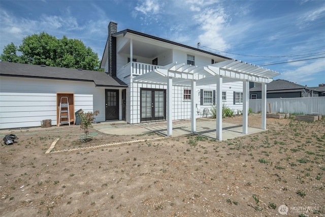 1609 Russell St, Wenatchee, WA 98801 - rear view of property featuring a patio, french doors, a pergola, and a chimney