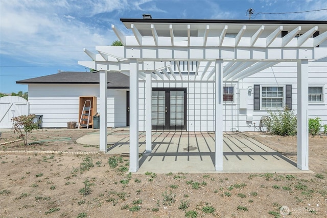 1609 Russell St, Wenatchee, WA 98801 - back of property with french doors, a pergola, and a patio