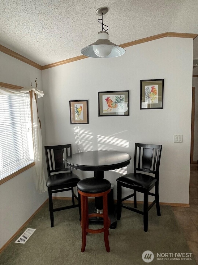 1200 Lincoln St Unit 117, Bellingham, WA 98229 - dining space with a textured ceiling and ornamental molding