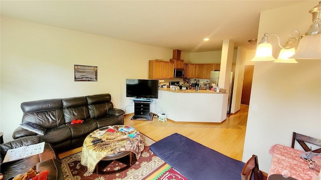 1317 52nd St NE Unit 1304, Auburn, WA 98002 - living area with light wood-style flooring and recessed lighting