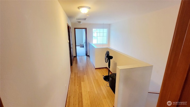 1317 52nd St NE Unit 1304, Auburn, WA 98002 - hall featuring an upstairs landing and light wood-style floors