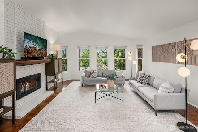8475 SE 45th St, Mercer Island, WA 98040 - living room with a brick fireplace, vaulted ceiling, and wood finished floors
