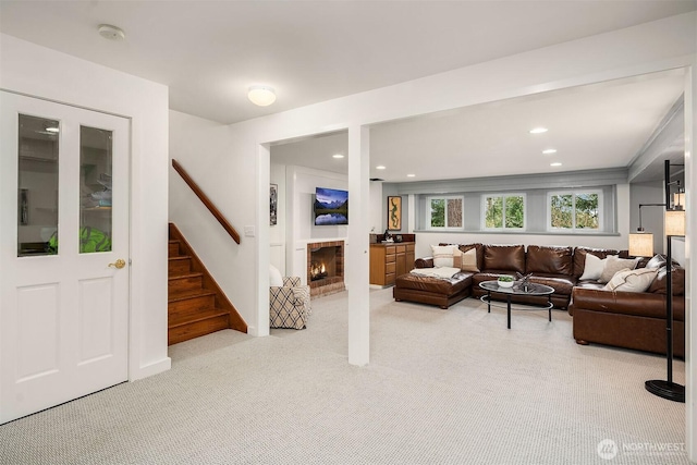 8475 SE 45th St, Mercer Island, WA 98040 - living room featuring light carpet, stairway, a brick fireplace, and recessed lighting