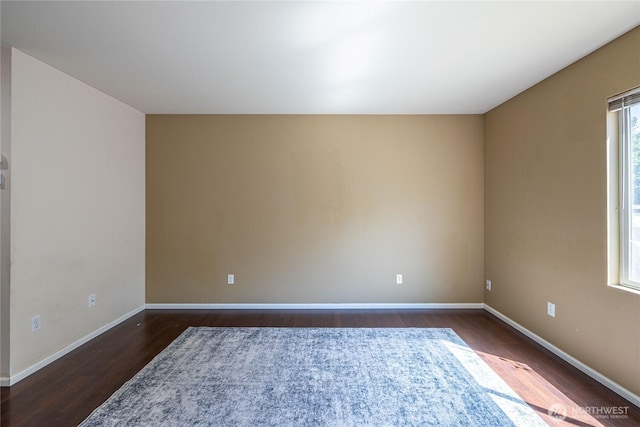 4151 69th Avenue Ct E, Fife, WA 98424 - spare room featuring dark wood-style floors and baseboards