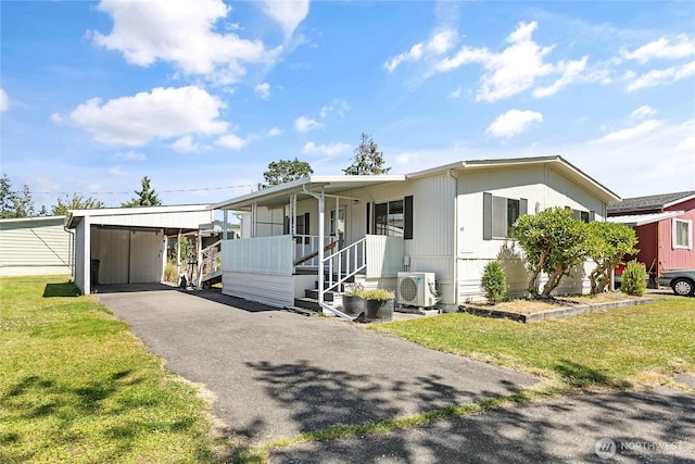 2400 Donovan Unit 67, Bellingham, WA 98225 - view of front of property featuring a front yard, asphalt driveway, and a carport