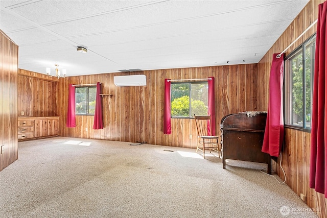 2400 Donovan Unit 67, Bellingham, WA 98225 - sitting room featuring carpet floors, wood walls, and an AC wall unit