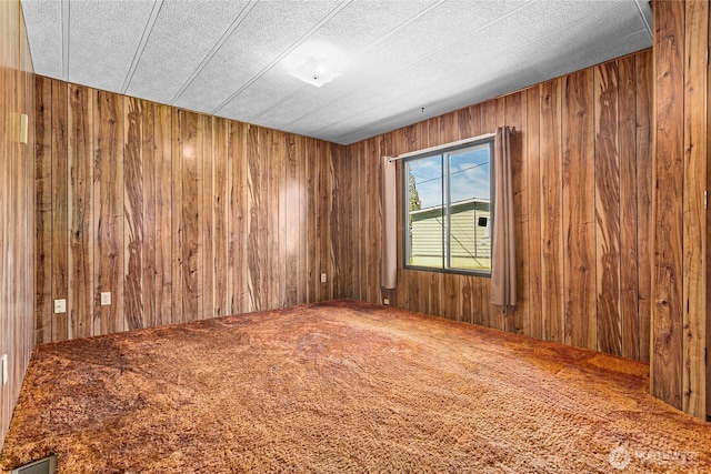 2400 Donovan Unit 67, Bellingham, WA 98225 - unfurnished room with wood walls and carpet