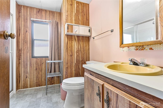 2400 Donovan Unit 67, Bellingham, WA 98225 - full bath featuring vanity, an enclosed shower, and wood walls