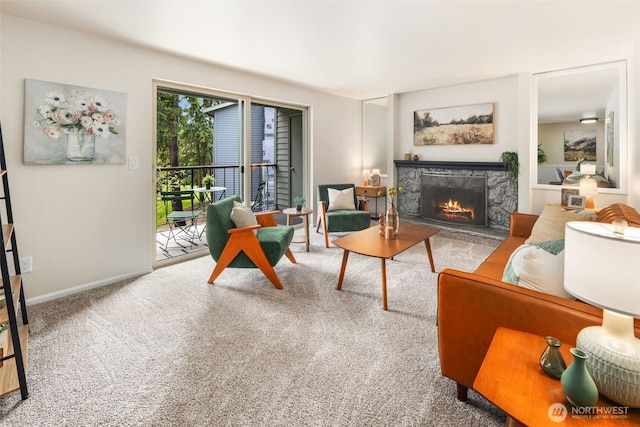 4635 W Lake Sammamish Pkwy SE Unit G206, Issaquah, WA 98027 - carpeted living room with a stone fireplace and baseboards