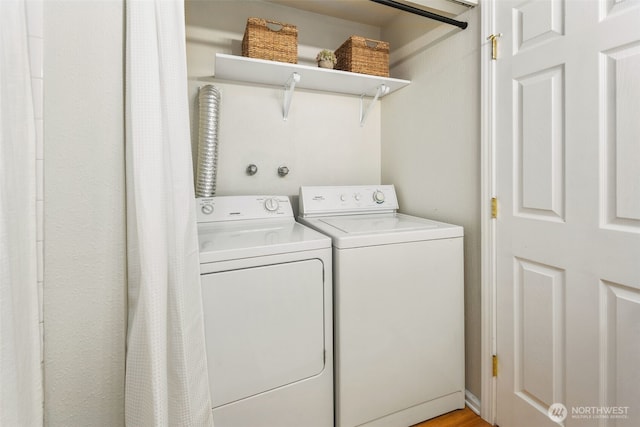 4635 W Lake Sammamish Pkwy SE Unit G206, Issaquah, WA 98027 - laundry area featuring independent washer and dryer