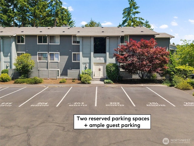 4635 W Lake Sammamish Pkwy SE Unit G206, Issaquah, WA 98027 - view of property featuring uncovered parking