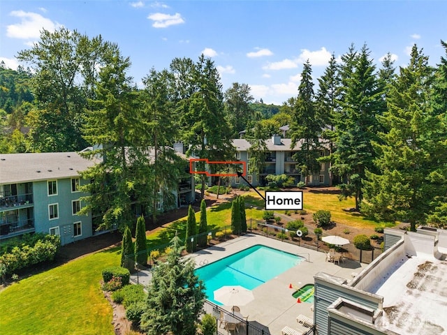 4635 W Lake Sammamish Pkwy SE Unit G206, Issaquah, WA 98027 - community pool with a patio area and a yard
