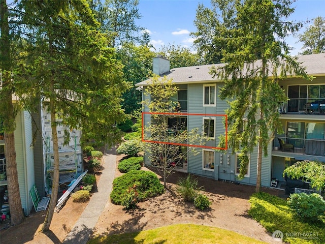4635 W Lake Sammamish Pkwy SE Unit G206, Issaquah, WA 98027 - back of property featuring a chimney