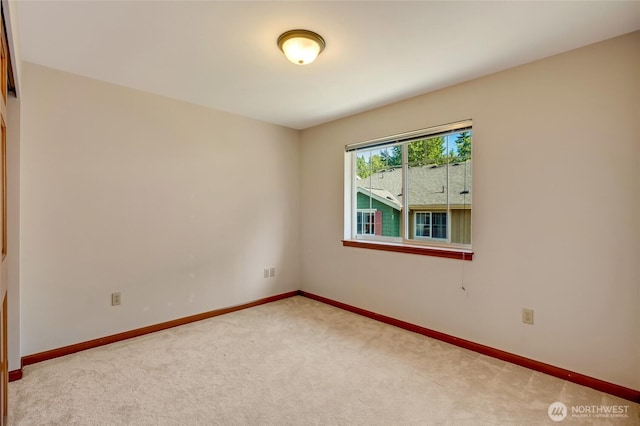 18526 36th Ave W Unit C, Lynnwood, WA 98037 - empty room featuring carpet and baseboards