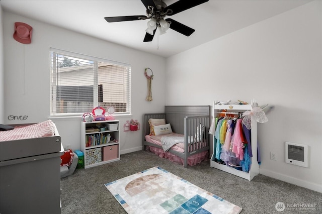 1664 Allyson St, Oak Harbor, WA 98277 - bedroom featuring heating unit, carpet, a ceiling fan, and a crib