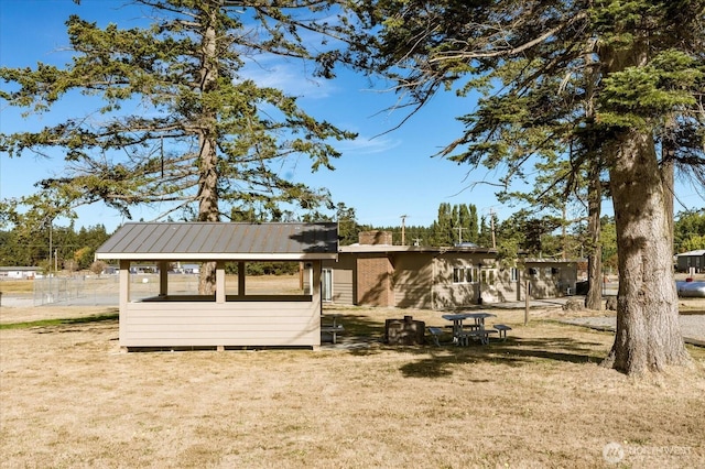 1664 Allyson St, Oak Harbor, WA 98277 - view of front facade featuring a front lawn and a metal roof
