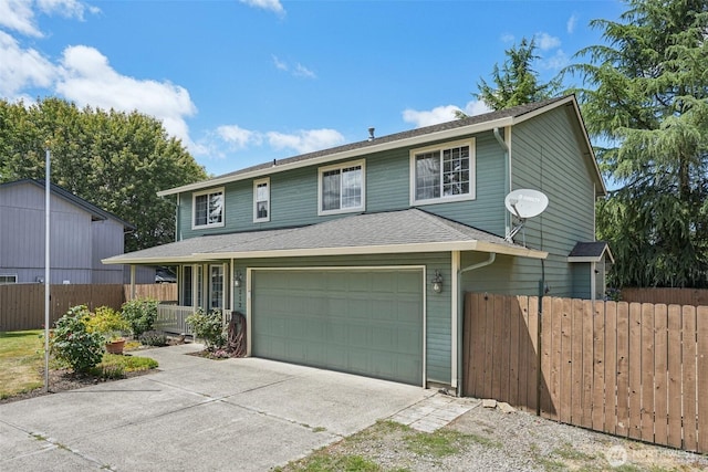 212 SW 2nd Ct, Battle Ground, WA 98604 - view of front facade featuring driveway, a garage, covered porch, and a shingled roof