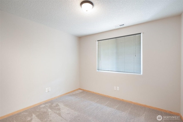 212 SW 2nd Ct, Battle Ground, WA 98604 - carpeted empty room featuring baseboards and a textured ceiling