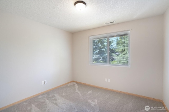 212 SW 2nd Ct, Battle Ground, WA 98604 - carpeted spare room featuring a textured ceiling