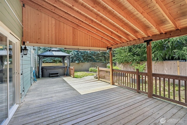 212 SW 2nd Ct, Battle Ground, WA 98604 - deck with a hot tub, a fenced backyard, and a gazebo