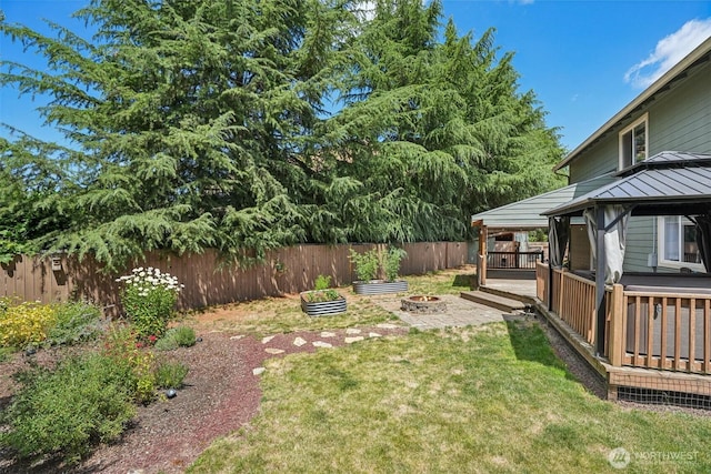 212 SW 2nd Ct, Battle Ground, WA 98604 - fenced backyard featuring a gazebo, a fire pit, and a wooden deck