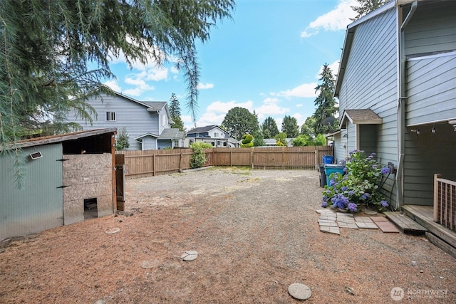 212 SW 2nd Ct, Battle Ground, WA 98604 - fenced backyard featuring an outdoor structure and a residential view