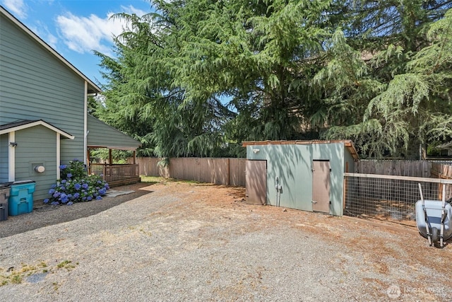 212 SW 2nd Ct, Battle Ground, WA 98604 - fenced backyard featuring a storage unit