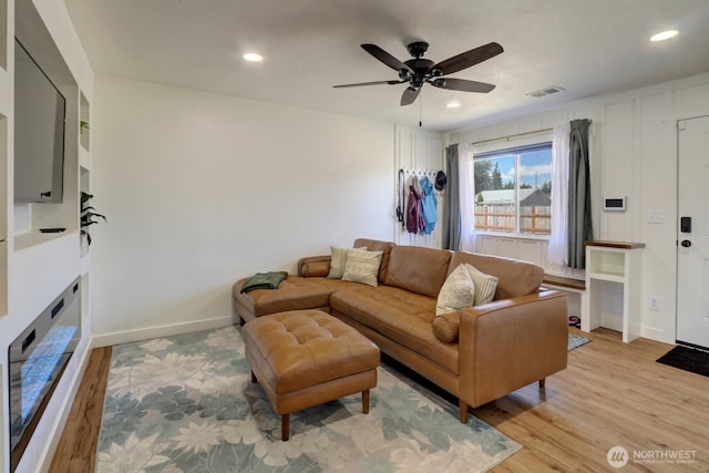 302 126th St S, Parkland, WA 98444 - living room featuring a ceiling fan, recessed lighting, and light wood-style floors