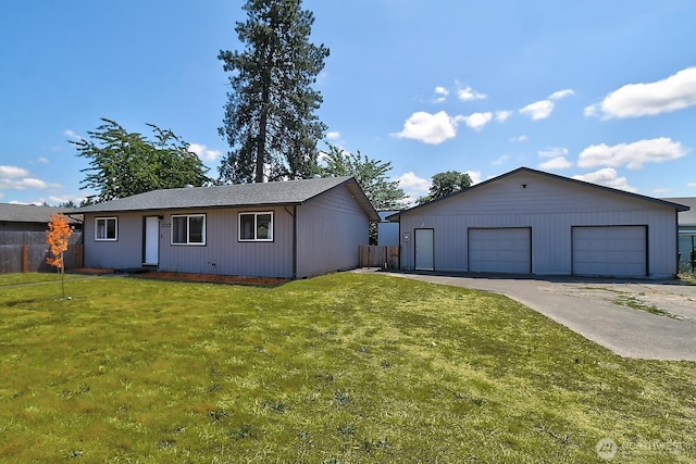 302 126th St S, Parkland, WA 98444 - view of front of house featuring a garage and an outbuilding