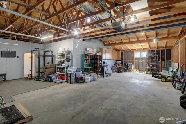 302 126th St S, Parkland, WA 98444 - garage featuring a garage door opener