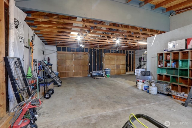 302 126th St S, Parkland, WA 98444 - garage featuring a garage door opener