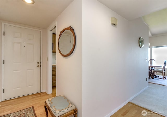 28313 Redondo Way S Unit 304, Des Moines, WA 98198 - hallway with light wood-type flooring and baseboards