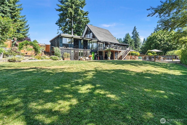 1432 Weathervane Dr, Fircrest, WA 98466 - rear view of property with stairs, a wooden deck, a sunroom, and a yard