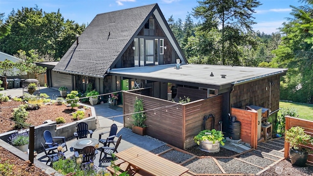 1432 Weathervane Dr, Fircrest, WA 98466 - rear view of house with a garage and a patio