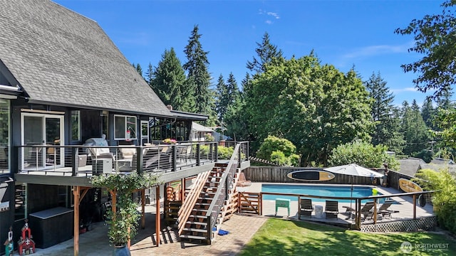 1432 Weathervane Dr, Fircrest, WA 98466 - view of swimming pool featuring a wooden deck, stairs, a patio, and a fenced backyard