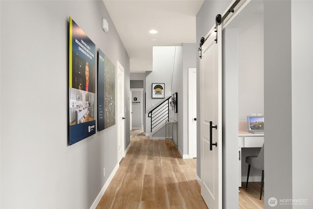 12433 SE 256th Pl Unit 4, Kent, WA 98030 - hallway with a barn door, light wood-style floors, stairs, recessed lighting, and a desk