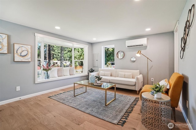 14427 156th Ave SE, Renton, WA 98059 - living area with a wall mounted AC, wood finished floors, and recessed lighting