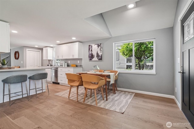 14427 156th Ave SE, Renton, WA 98059 - dining room with light wood finished floors and recessed lighting
