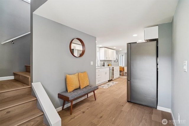 14427 156th Ave SE, Renton, WA 98059 - living area with stairway, light wood-style floors, and recessed lighting