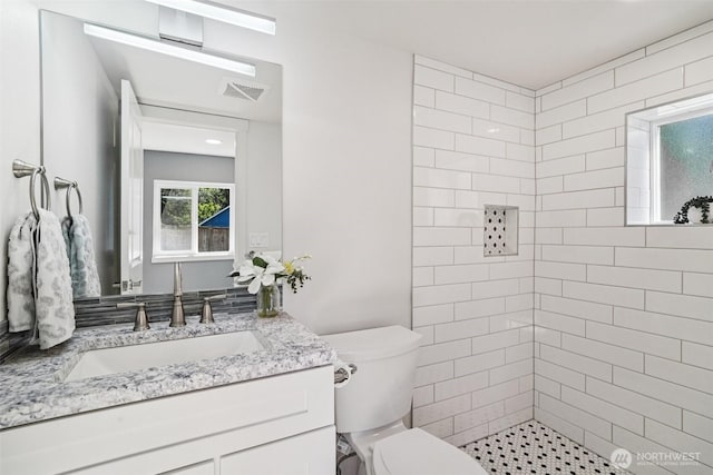 14427 156th Ave SE, Renton, WA 98059 - full bathroom featuring vanity and a tile shower
