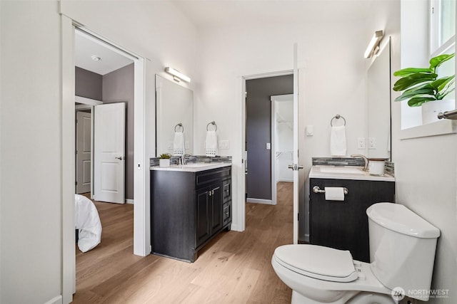 14427 156th Ave SE, Renton, WA 98059 - bathroom featuring wood finished floors and vanity