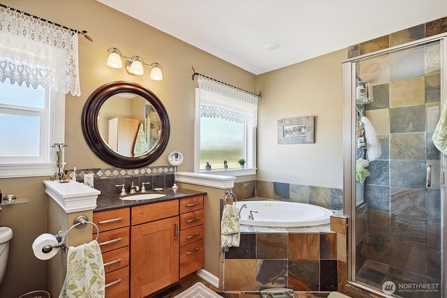 505 Woodland Rd, Goldendale, WA 98620 - bathroom featuring vanity, a stall shower, and a garden tub