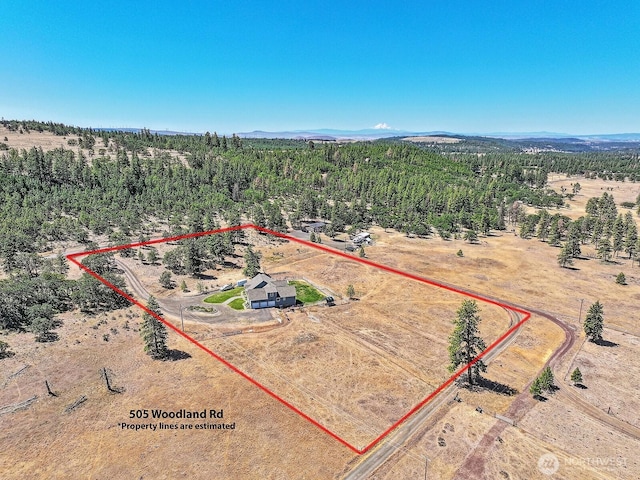 505 Woodland Rd, Goldendale, WA 98620 - aerial overview of property's location featuring property boundaries highlighted and rural landscape
