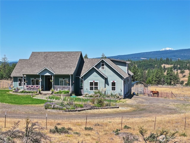 505 Woodland Rd, Goldendale, WA 98620 - view of front of property featuring covered porch, roof with shingles, and driveway