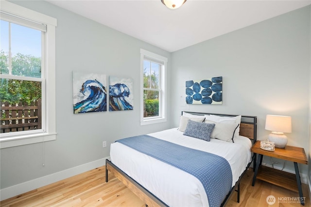 26 Lavender Ln, Pacific Beach, WA 98571 - bedroom featuring wood finished floors and baseboards